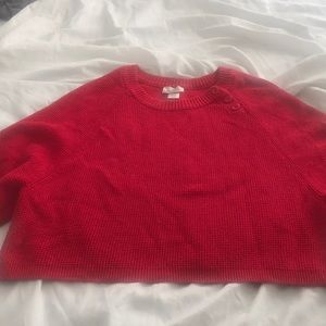 Cropped red knit sweater